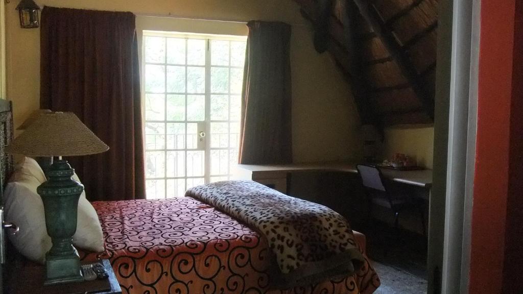 Treetops & Treats Guest House Pretoria-Noord Pokoj fotografie